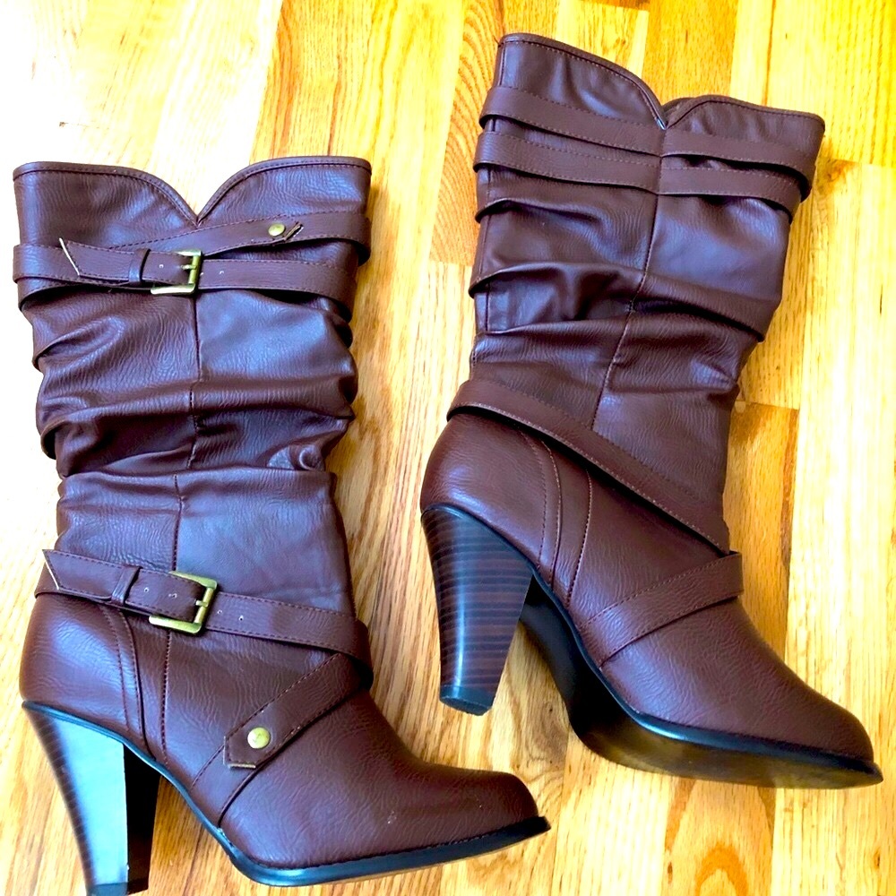 Gently worn brown leather fashion heel boots